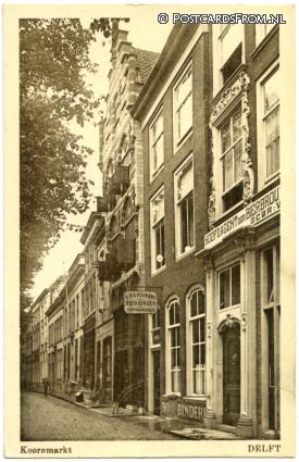 ansichtkaart: Delft, Koornmarkt. S.P.A. Koumans, Boekbinder